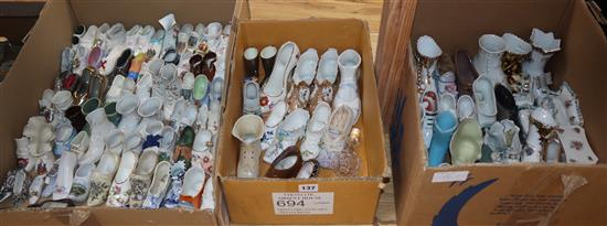 A shoe and slipper collection, largely ceramic